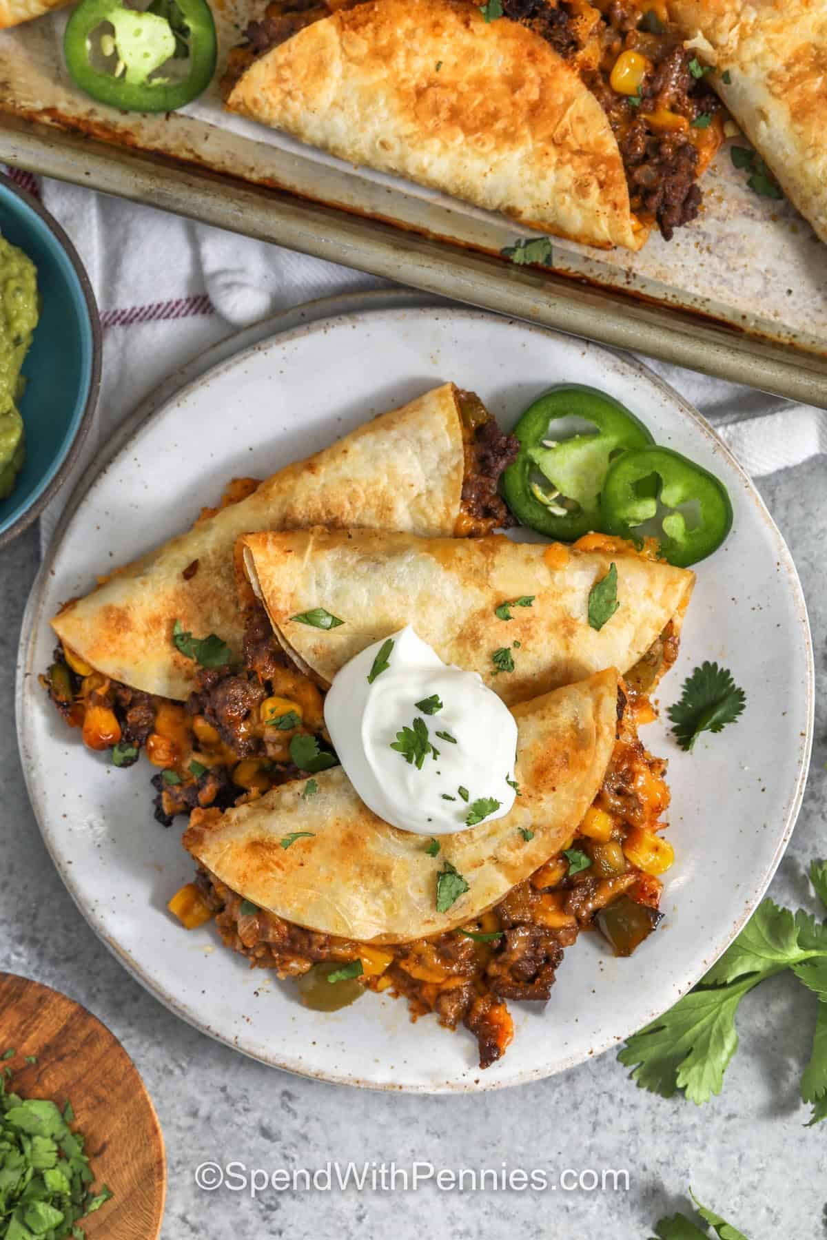 top view of crispy tacos on a plate