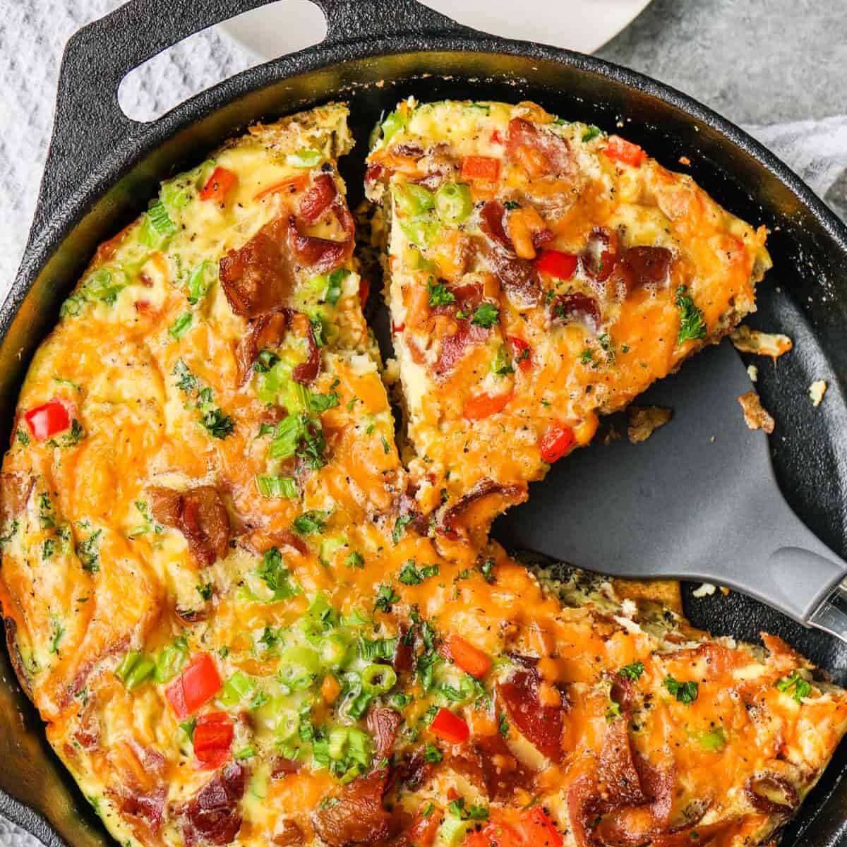 showing How to Make a Frittata by taking a slice out of the pan