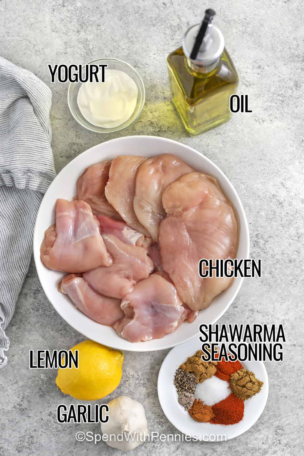 Make chicken shawarma at home with a simple oven method and everyday ingredients. Chicken thighs are marinated with yogurt, lemon juice, garlic, olive oil, and a warm homemade shawarma spice blend, then baked until tender and sliceable. Add optional toppings like cucumber, tomato, lettuce, red onion, and white sauce for a fresh, flavorful dinner that is easy to customize. #spendwithpennies chicken , yogurt , oil , lemon , garlic , shawarma seasoning with labels to make Chicken Shawarma