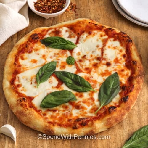 Margherita Pizza with basil leaves