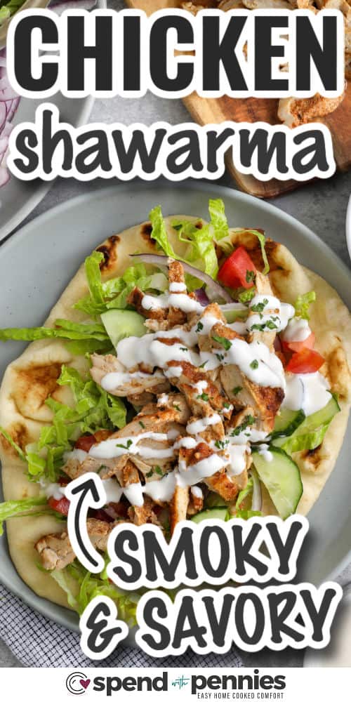 Homemade chicken shawarma is a flavorful oven-baked chicken recipe with juicy slices and crisp edges. The marinade uses plain yogurt, fresh lemon juice, garlic, and shawarma seasoning to tenderize the chicken and add warm, savory flavor. Serve it with rice, pitas, fresh vegetables, and a creamy white sauce for an easy dinner that feels fresh, filling, and family-friendly. #spendwithpennies smoky and savory Chicken Shawarma with writing