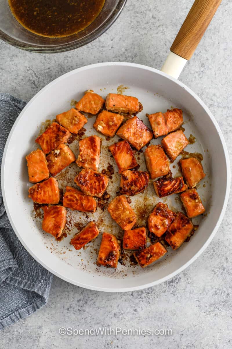 cooked salmon in a pan to make Salmon Bowl Recipe