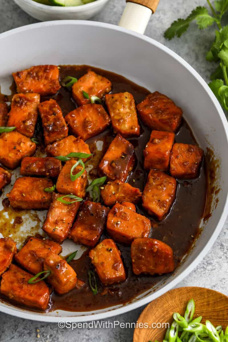 cooked salmon in a pan to make Salmon Bowl Recipe