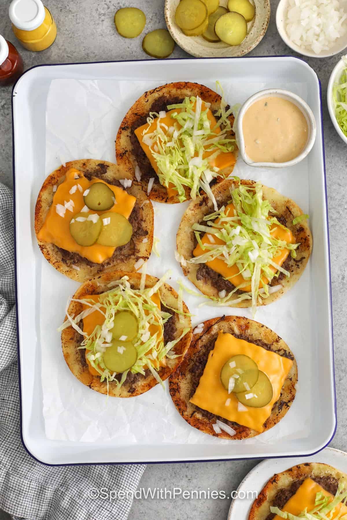 top view of open faced Smash Burger Tacos on plate