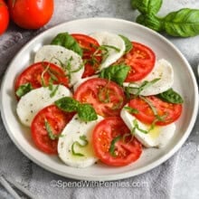 plate of Caprese Salad with basil