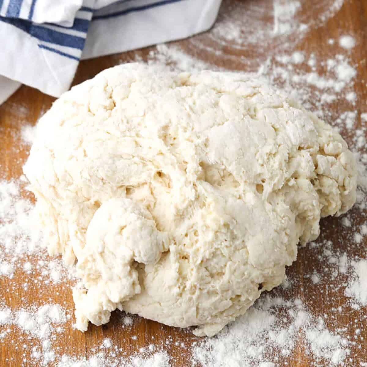 dough with flour to make Homemade Biscuits