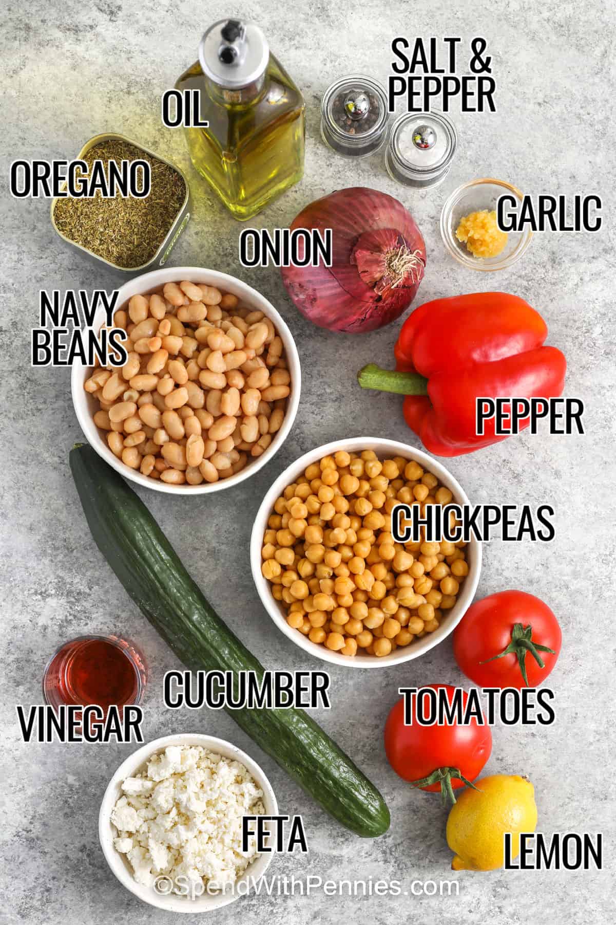 oregano , oil , onion , navy beans , chickpeas, cucumber, vinegar , feta , tomatoes , lemon , salt and pepper with labels to make Dense Bean Salad