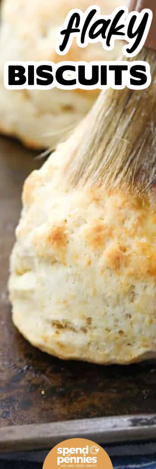 buttery Homemade Biscuits on a sheet pan with a title