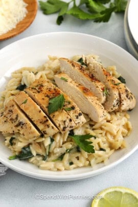 close up of Lemon Chicken Orzo with sliced chicken on top