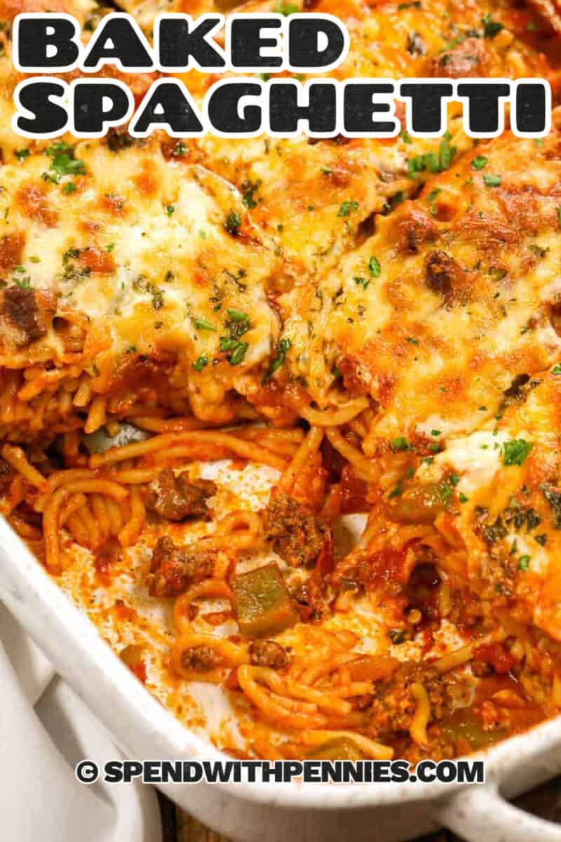 This baked spaghetti recipe is all about easy comfort. A quick meat sauce with marinara and tomatoes coats spaghetti noodles, then the casserole is finished with mozzarella and Parmesan for a browned, bubbly top. It is a spaghetti casserole that works for weeknight dinner, casual entertaining, and meal prep since leftovers stay flavorful and reheat well. #spendwithpennies zesty and hearty Baked Spaghetti with writing