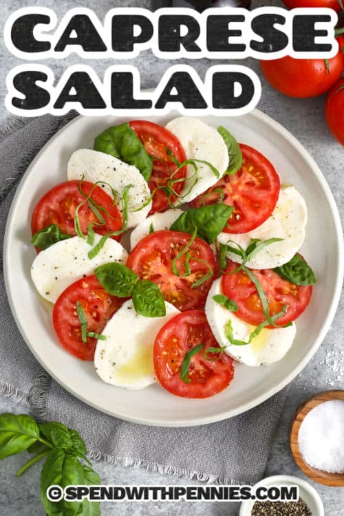 fresh Caprese Salad on a plate with a title