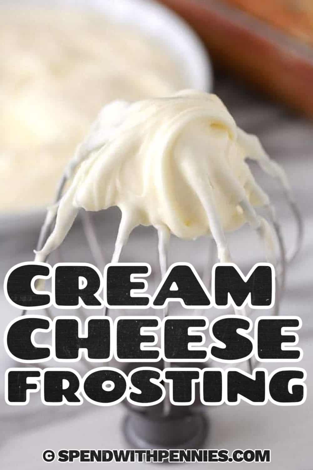 Cream cheese frosting on a beater with a title