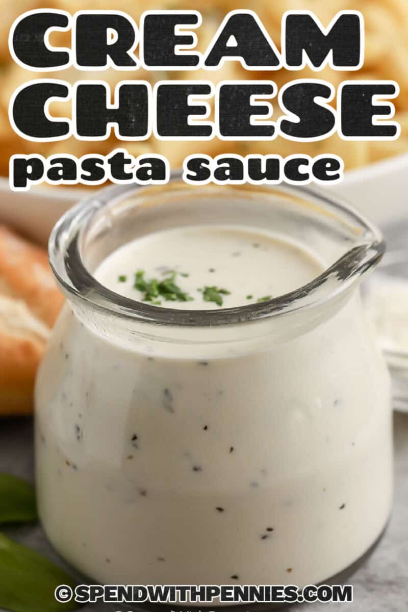 This cream cheese pasta sauce with cream cheese is a practical weeknight recipe that feels warm and homemade. The sauce is smooth and cheesy with garlic, basil, and Parmesan, and it does not require heavy cream. Toss it with hot pasta for a simple dinner, or use it as a creamy base for baked pasta, vegetables, or leftover rotisserie chicken. #spendwithpennies jar of Cream Cheese Pasta Sauce with writing