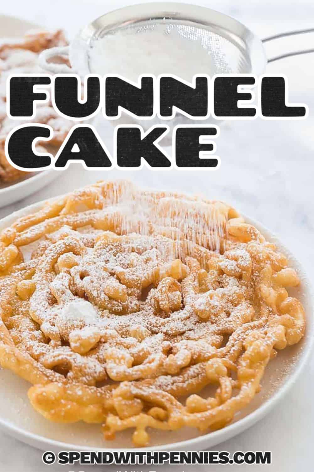 adding icing sugar to Funnel Cake with a title
