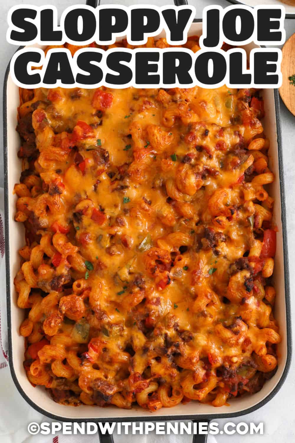 cheesy Sloppy Joe Casserole in a casserole dish with a title