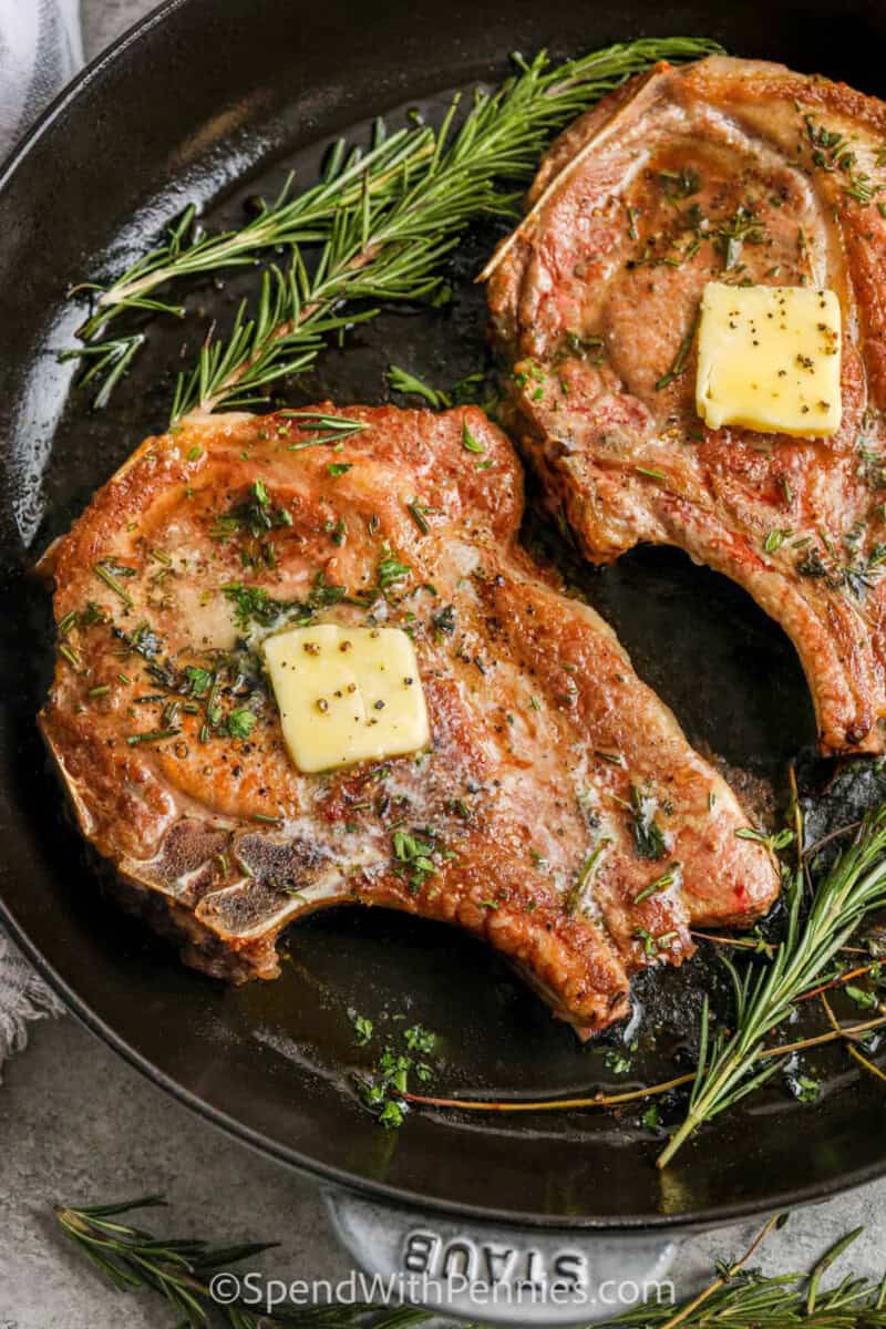 These pan seared pork chops are a delicious one-skillet dinner with a crisp crust and savory butter finish. Thick pork chops are seasoned simply so the browned edges and herb butter can shine. The recipe is quick, practical, and easy to pair with classic sides like mashed potatoes, roasted broccoli, green beans, or rice. Make this recipe for a dependable way to make pork chops that taste tender, rich, and homemade. #spendwithpennies Pan Seared Pork Chops in the pan