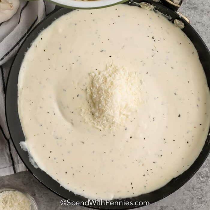 finished Cream Cheese Pasta Sauce in the pan with cheese
