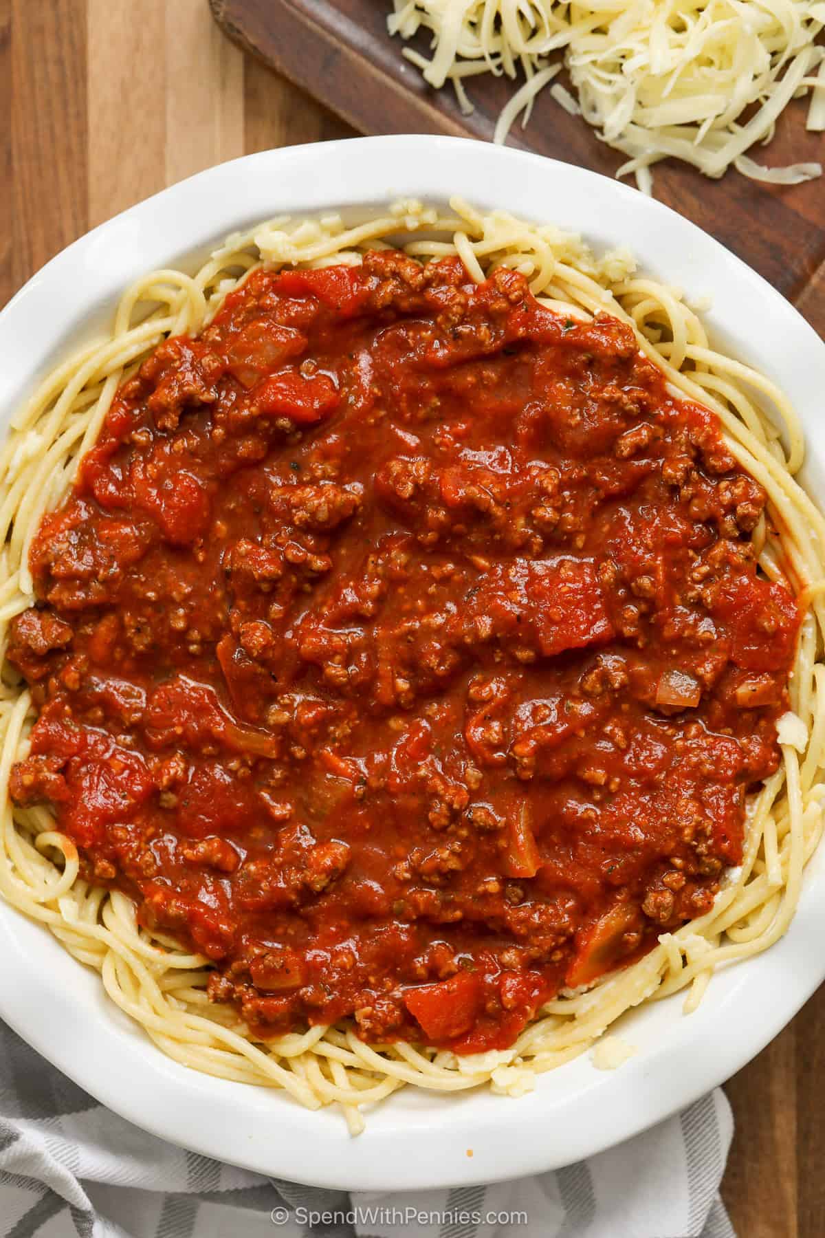 Straightforward Baked Spaghetti Pie 19 meat sauce on top of a spaghetti pie