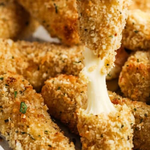 close up of cheesy Air Fryer Mozzarella Sticks