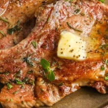close up of Pan Seared Pork Chops with butter