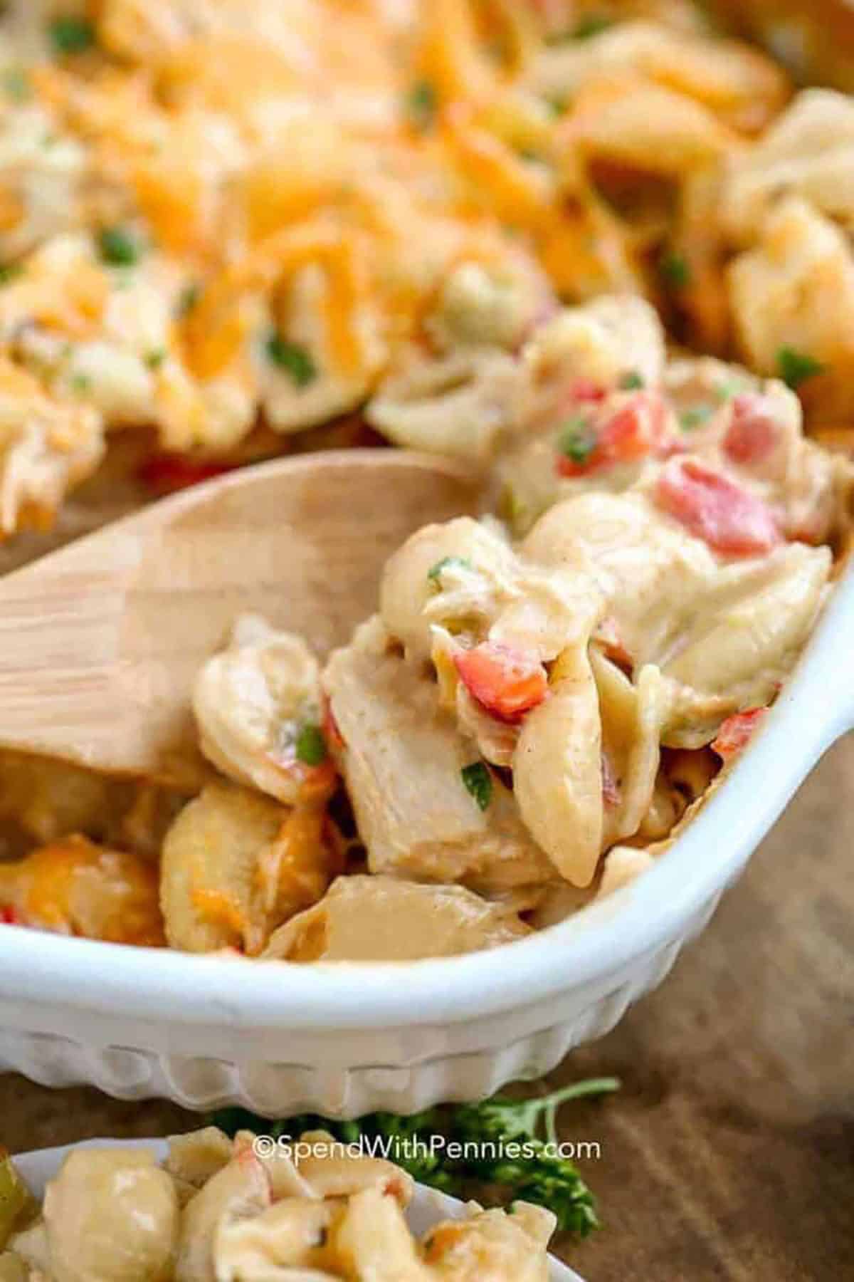 Cheesy Chicken Casserole in a casseroeldish and plated
