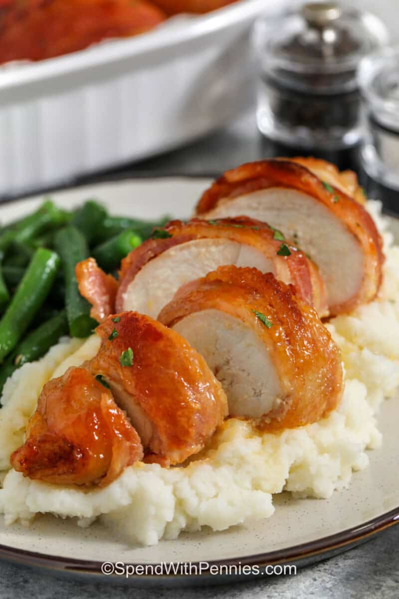Bacon Wrapped Chicken on mashed potatoes