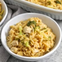 plated Chicken Orzo Bake with dish full in the back