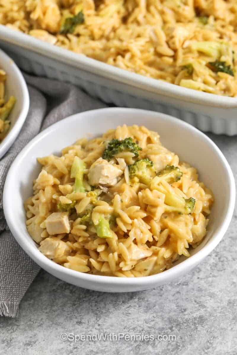 plated Chicken Orzo Bake with dish full in the back