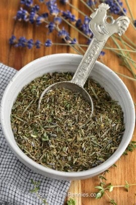Herbes de Provence in a bowl with lavender beside it