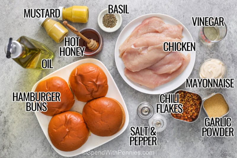 mustard , oil , hot honey , basil , hamburger buns , chicken , vinegar , mayonnaise , chil flakes , garlic powder , salt and pepper with labels to make Hot Honey Chicken Sandwich