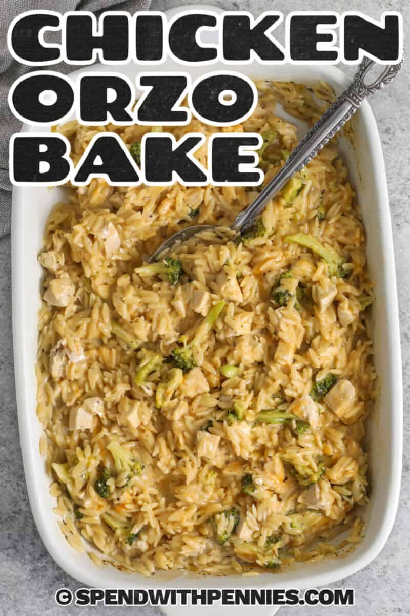Make this chicken orzo bake when you need an easy comfort food dinner with simple ingredients. Cooked chicken, bite sized broccoli, dry orzo, chicken broth, milk, and cheddar cheese bake together until creamy and tender. This recipe is especially helpful for using leftover chicken or rotisserie chicken, and frozen broccoli can be added straight from the freezer for faster prep. #spendwithpennies Chicken Orzo Bake in a casserole dish with a title