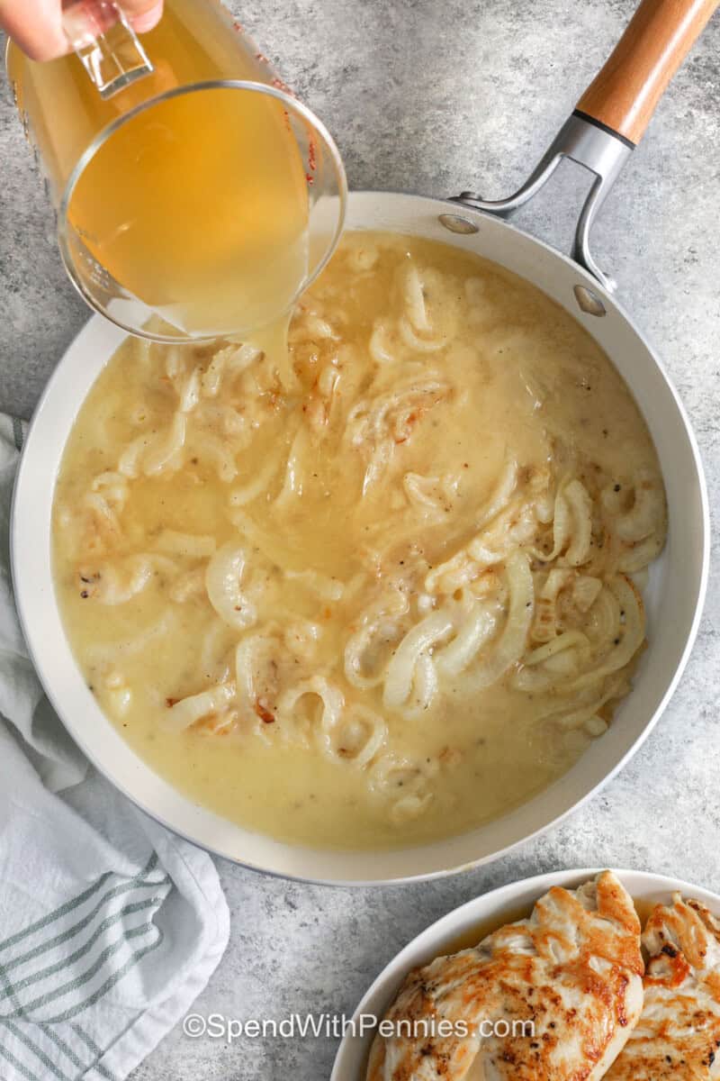 adding broth to pan to make Smothered Chicken
