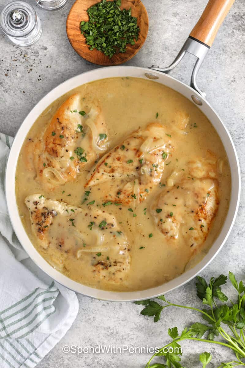 pan of Smothered Chicken with onions and parsley