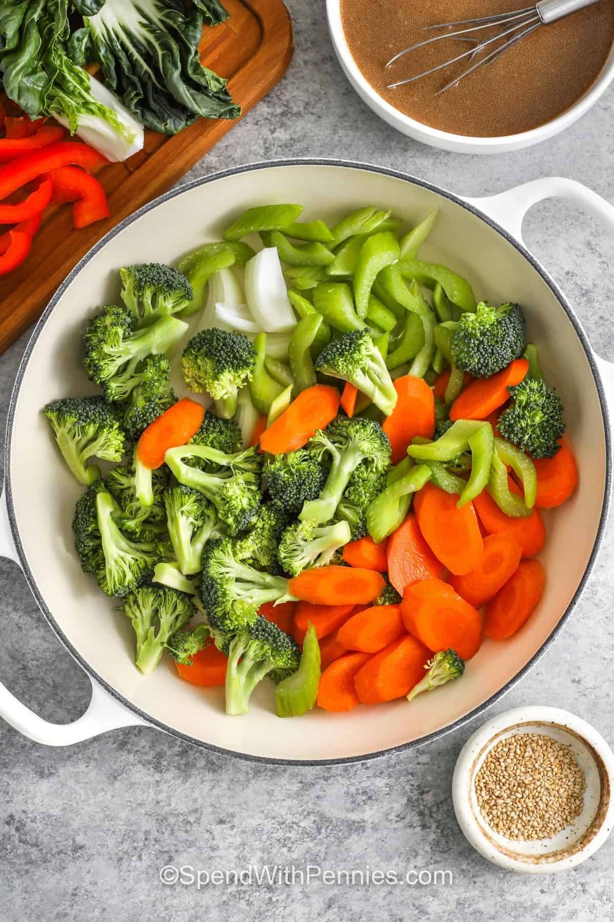 adding sliced vegetables to pot to make Stir Fry Vegetables