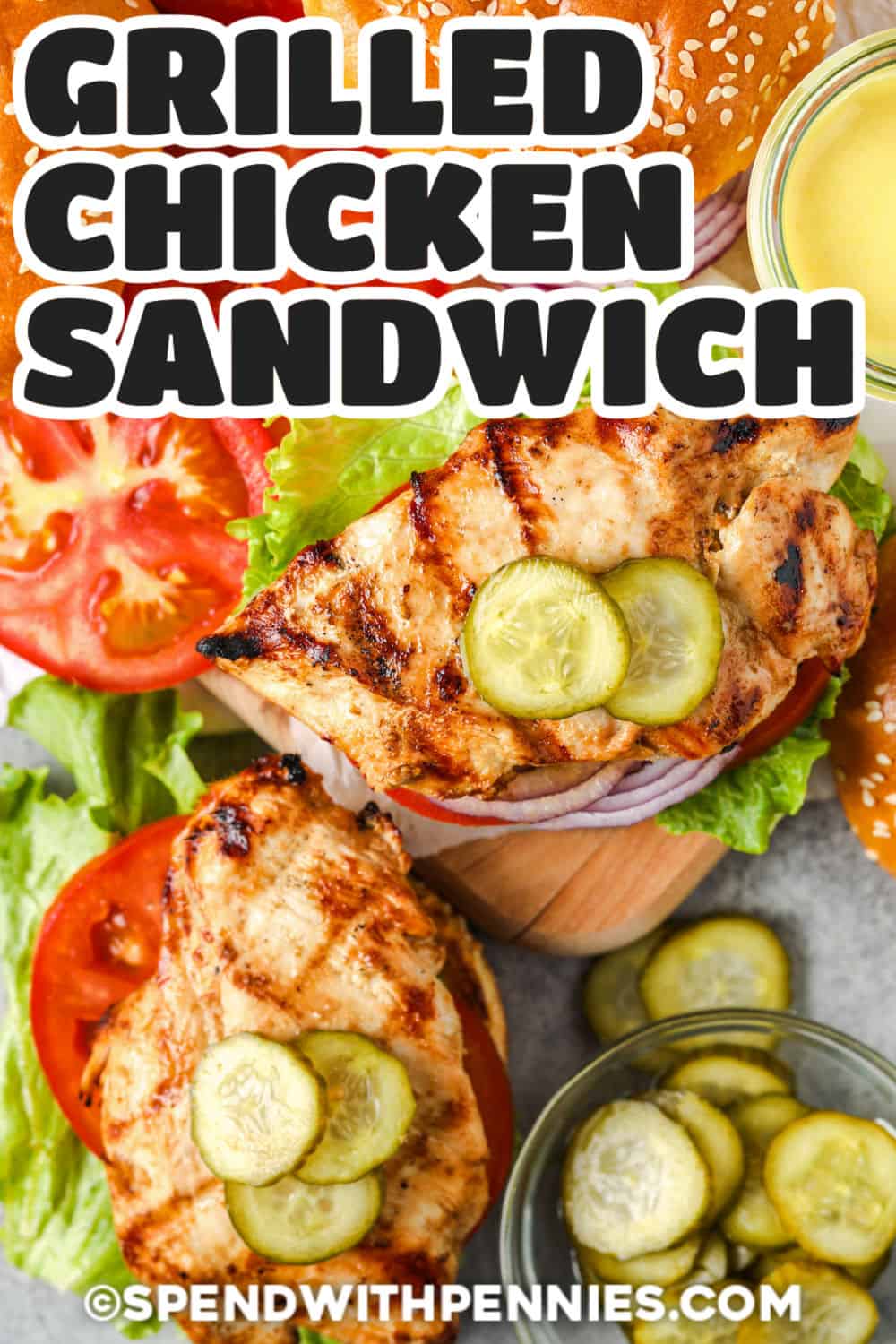 This grilled chicken sandwich is loaded with juicy chicken breast, creamy honey mustard, and crisp lettuce, tomato, onion, or pickles. A simple Dijon and apple cider vinegar marinade adds tangy flavor while pounding the chicken helps it cook quickly and evenly. Serve each piece on a lightly toasted hamburger bun or brioche roll for an easy summer dinner that is perfect for family meals, cookouts, and relaxed weekends outside. Pin this to your grilling board. #spendwithpennies Grilled Chicken Sandwich with pickles and a title