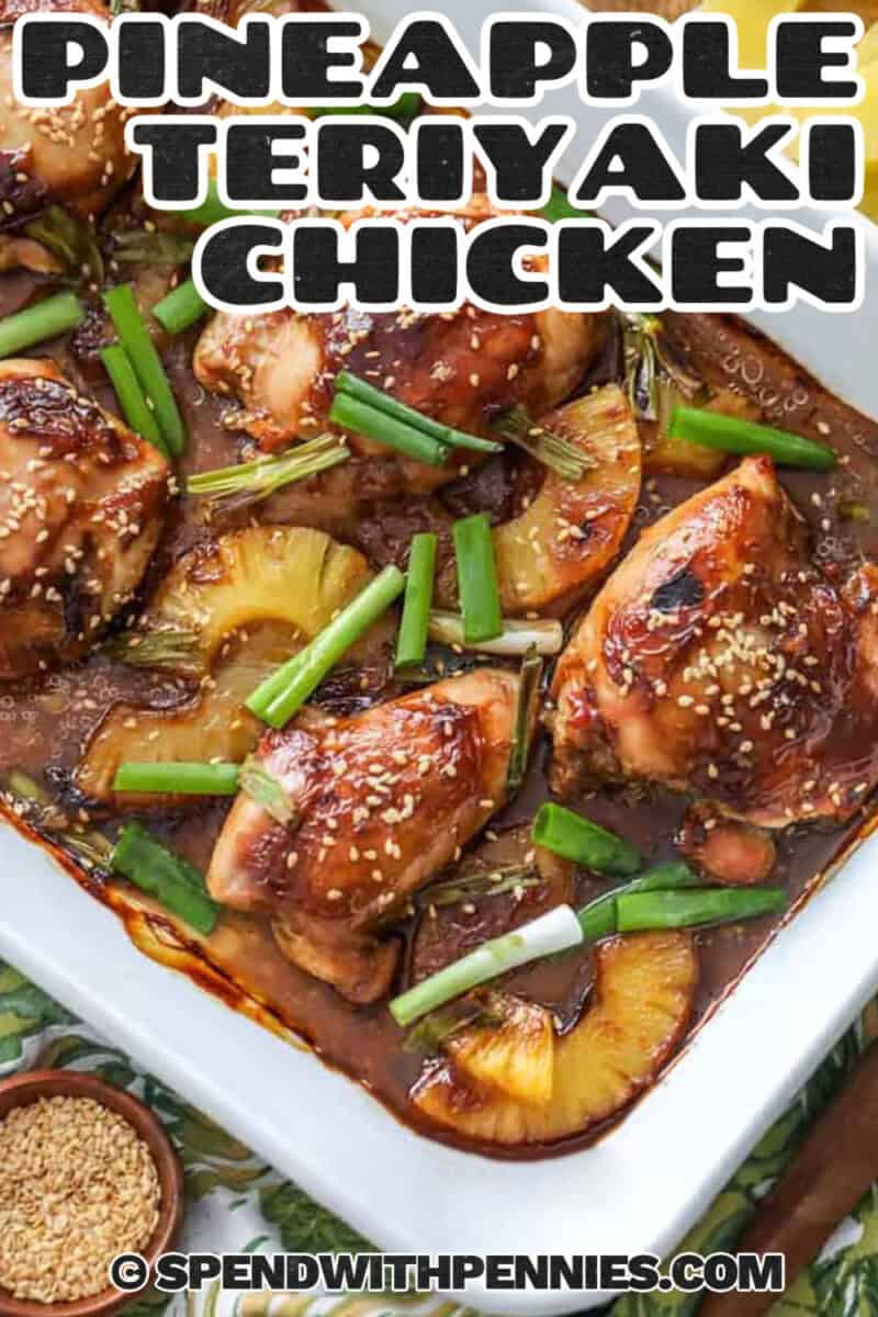 Pineapple Teriyaki Chicken in a dish with pineapples and green onions