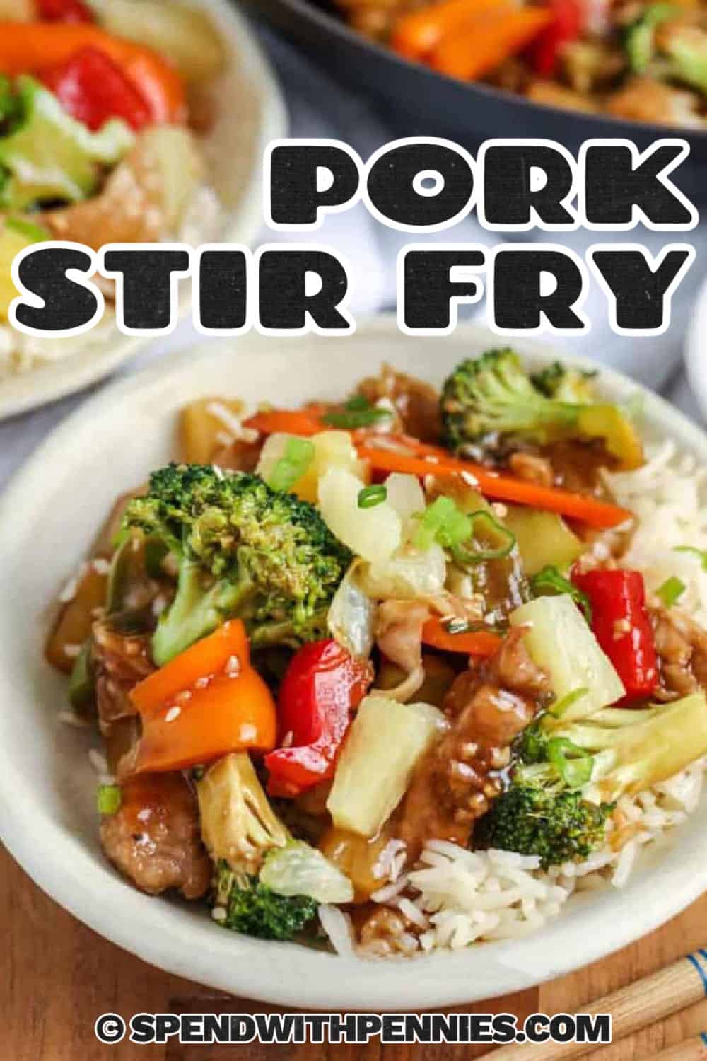 Make pork stir fry at home with thin strips of pork, crisp vegetables, and a sweet-savory sauce made with pineapple juice, soy sauce, brown sugar, garlic, ginger, and sesame oil. This recipe cooks quickly once everything is prepped, making it a great choice for busy evenings. Serve it over steamed rice, fried rice, or noodles for an easy dinner with takeout-style flavor. #spendwithpennies bowls of Pork Stir Fry with a title
