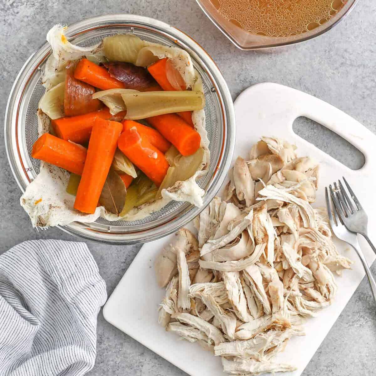 shredding chicken and straining vegetables to make Old Fashioned Chicken and Dumplings