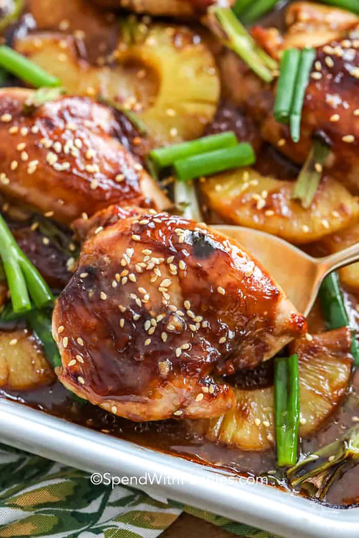 taking Pineapple Teriyaki Chicken out of the dish