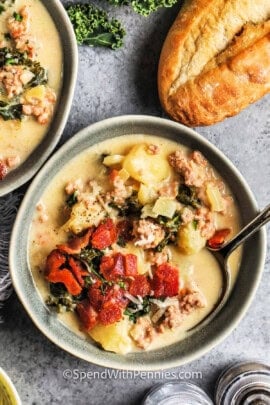 bowls of Zuppa Toscana with bread.