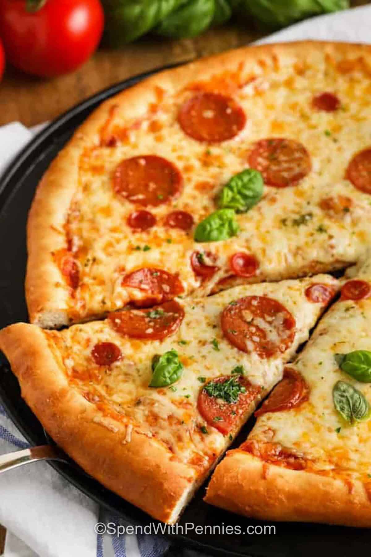sliced pizza made with Homemade Pizza Dough
