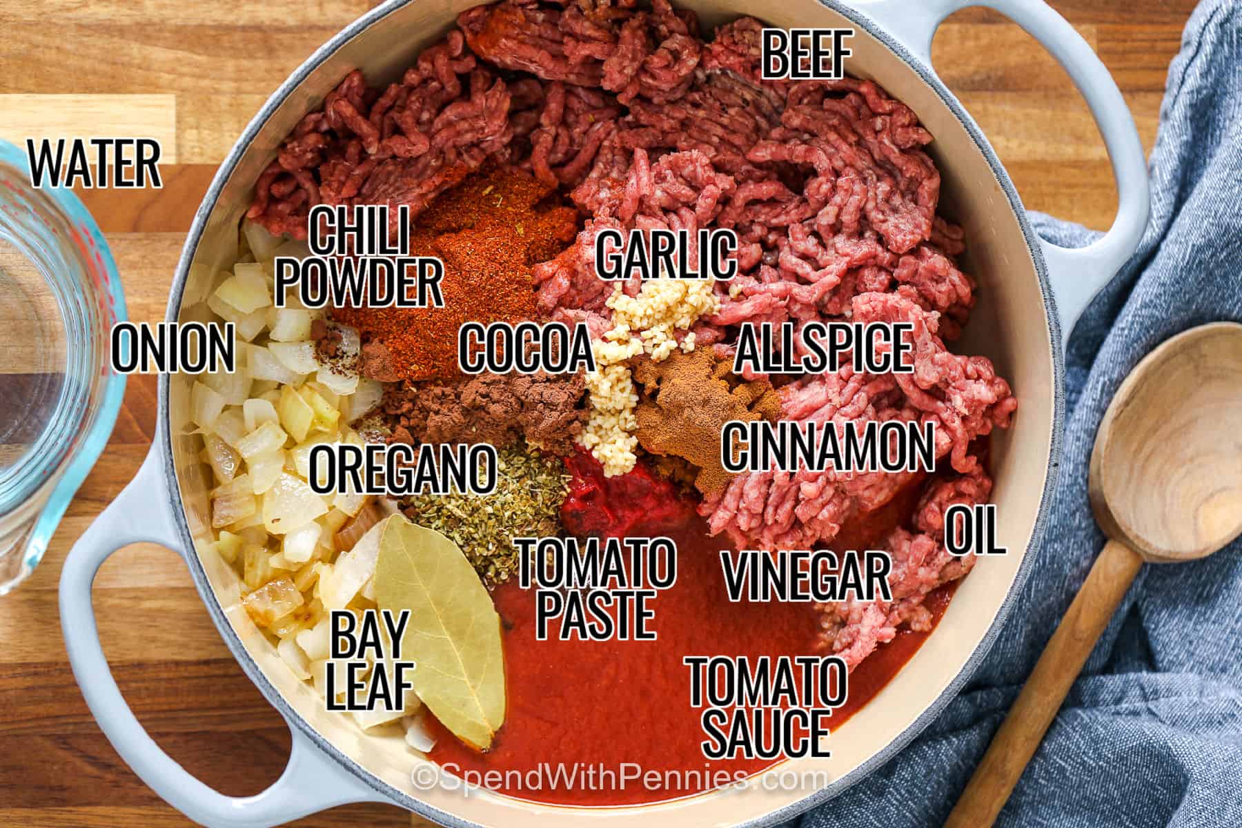 Cincinnati chili sauce is a flavorful way to turn ground beef and simple pantry ingredients into a cozy make-ahead meal. A long stovetop simmer brings together tomato sauce, chili powder, cocoa, cinnamon, allspice, and a splash of apple cider vinegar. Keep the sauce separate from the spaghetti and toppings for easy leftovers or freezing. Save this chili recipe for a practical meal-prep dinner everyone can customize. #spendwithpennies beef , water , onion , chili powder , cocoa , garlic , allspice , cinnamon , oil , vinegar , tomato sauce , tomato paste , oregano , bay leaf with labels to make Cincinnati Chili