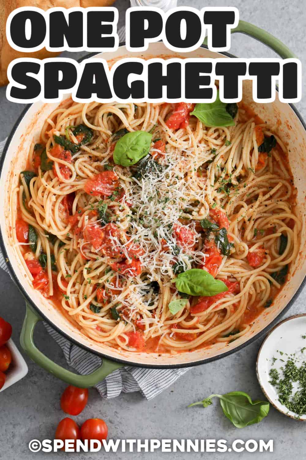 This easy one-pot spaghetti is packed with sweet cherry tomatoes, tender spinach, fresh basil, lemon zest, and Parmesan. Everything cooks in one deep skillet or Dutch oven, so the pasta absorbs plenty of fresh tomato flavor while the cooking liquid becomes a silky sauce. With simple prep and just one pot to clean, it is a practical choice for busy evenings. Pin this one pot pasta recipe for your next quick weeknight meal. #spendwithpennies One Pot Spaghetti in the pot with a title
