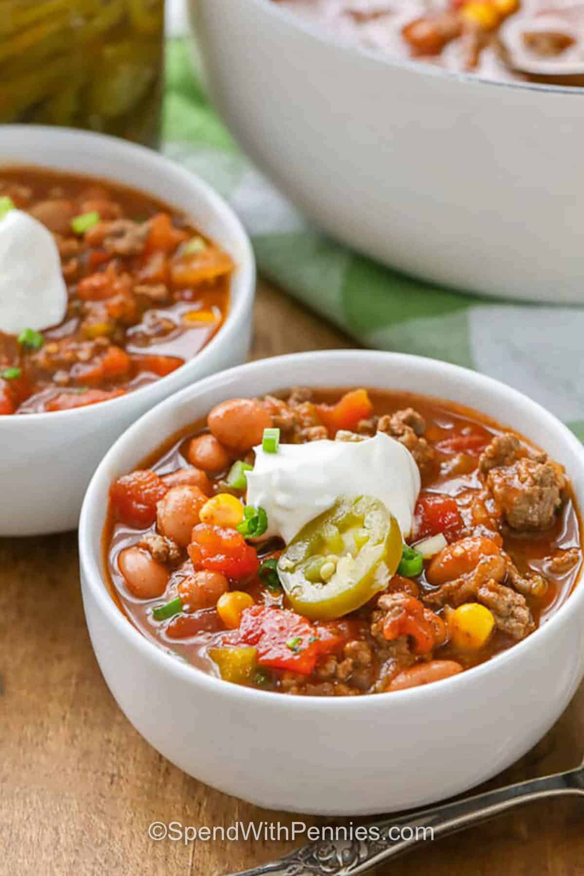 bowls of Taco Soup Recipe with sour cream and jalapeño on top