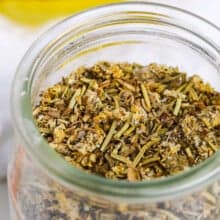 close up of Greek Seasoning in a jar.