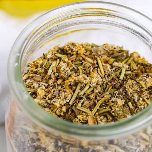 close up of Greek Seasoning in a jar.