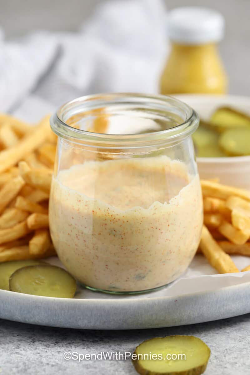 plate of fries with a jar of Big Mac Sauce.