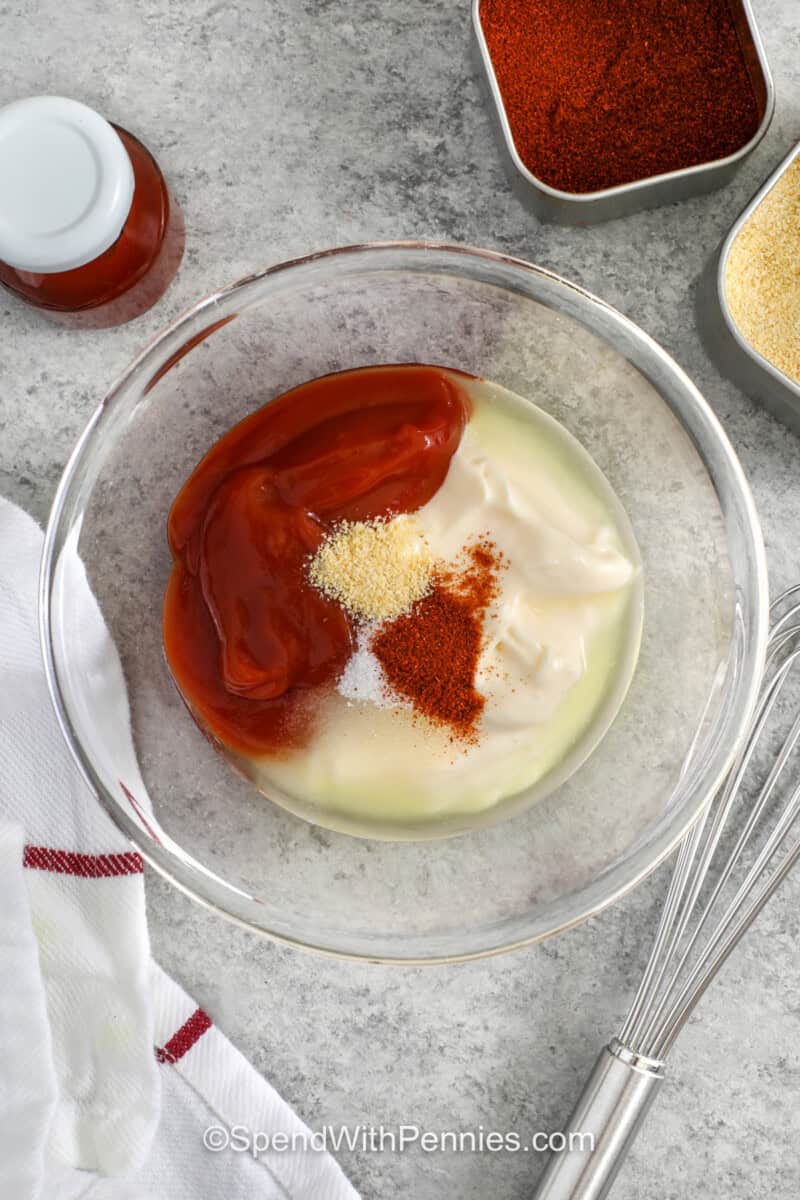 adding ingredients together to make Fry Sauce.