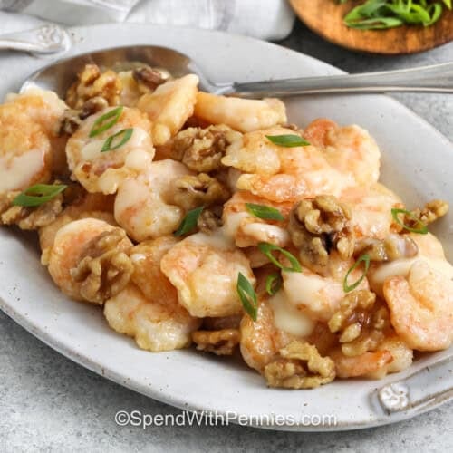 plated Honey Walnut Shrimp with green onions.
