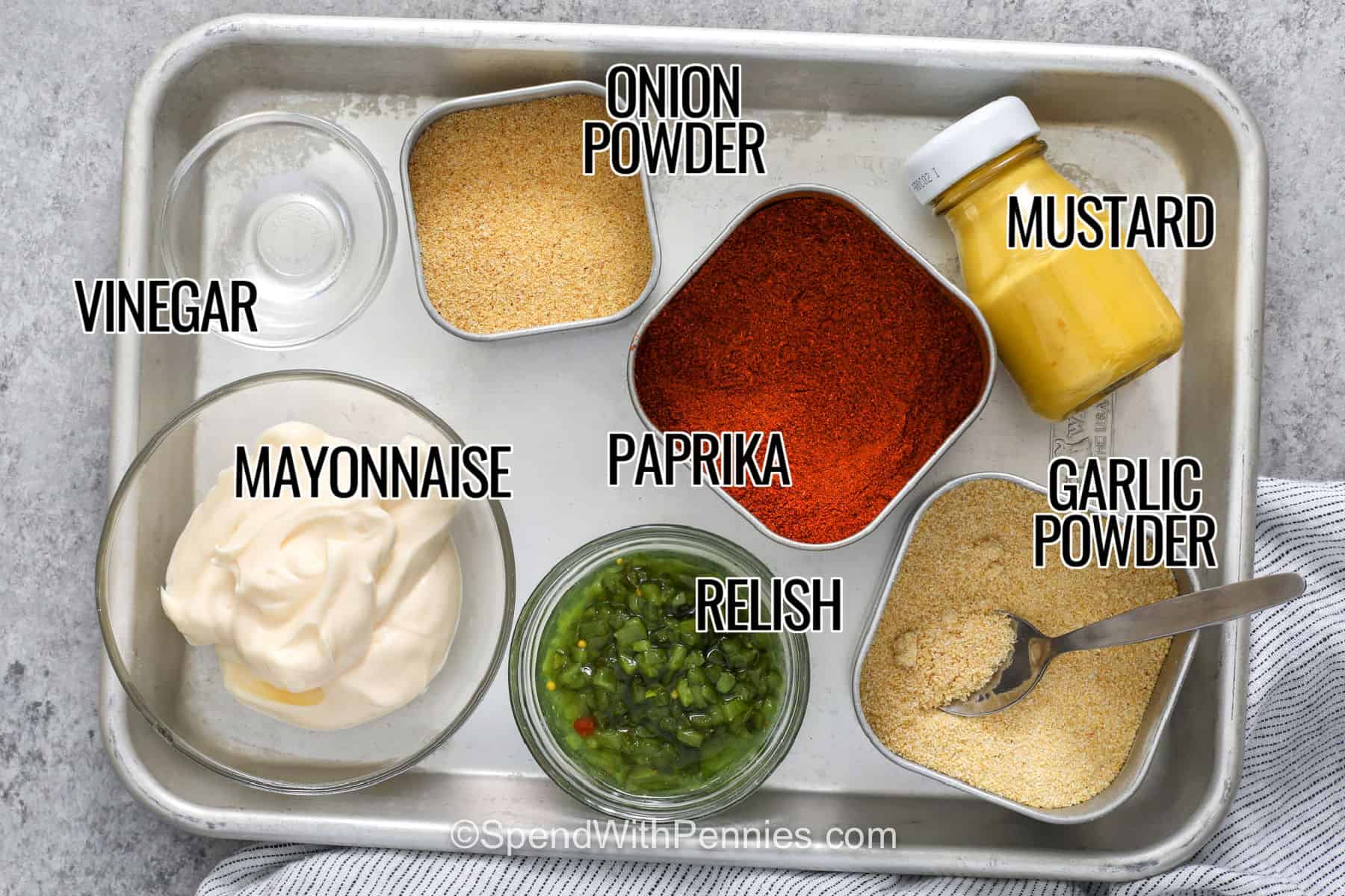 This Big Mac Sauce recipe brings creamy, tangy burger-shop flavor to dinner with just a handful of simple ingredients. Mayonnaise makes a rich base while sweet pickle relish, yellow mustard, white vinegar, paprika, onion powder, and garlic powder add sweetness and zip. It is a quick no-cook sauce for burgers, fries, sandwiches, wraps, or burger bowls. Save this easy homemade sauce for your next burger night. #spendwithpennies onion powder , garlic powder , paprika , relish , vinegar , mustard and mayonnaise with writing to make Big Mac Sauce.